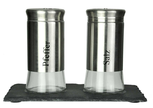 Salt and pepper shakers on a sheer plate, spice shakers, salt shakers