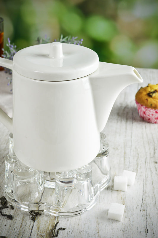 Théière en porcelaine avec cafetière plus chaude, théière en porcelaine